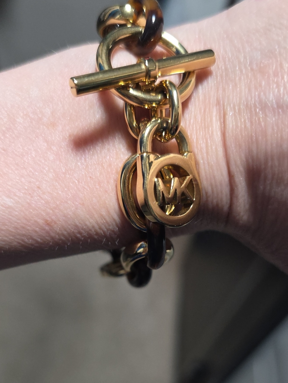Michael Kors Gold Link Bracelet with MK Logo Charms